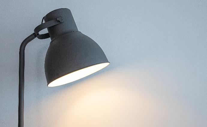 black pendant lamp turned on in room